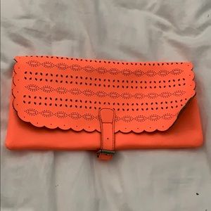 Bright orange clutch